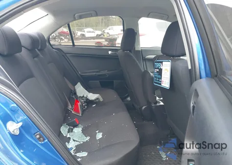 2015 Mitsubishi Lancer Es from USA, damaged, VIN JA32U2FU5FU008677